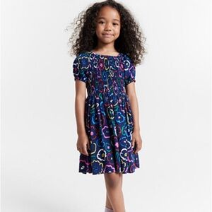 Like new! Worn only for picture day.  Rayon dress with smocked top.